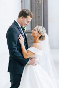 bride and groom stand face to face looking at each other and smiling wedding venues in columbus ohio