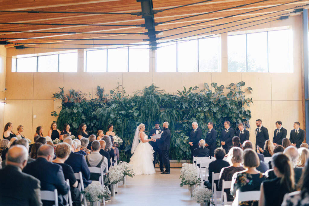 wedding ceremony in modern ceremony space at Jorgensen Farms