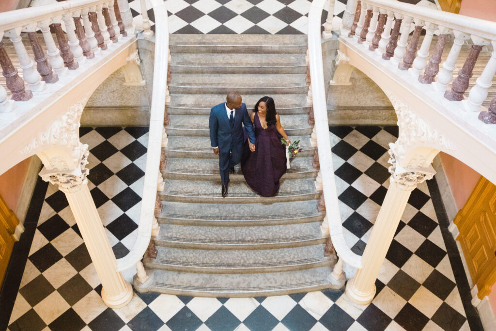 bride and groom defend steps in ballroom of The Ohio Statehouse