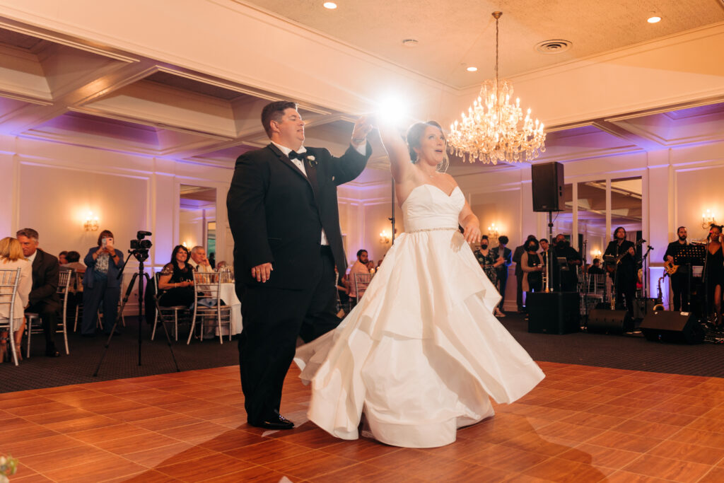 First Dance with bride and groom under the chandelier at The Boat House