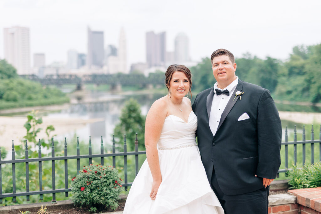 bride and groom overlooking skyline at The Boat House 