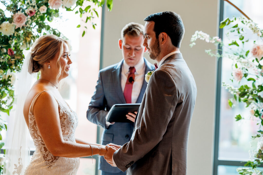 wedding ceremony infront of the widows at Le Meridian