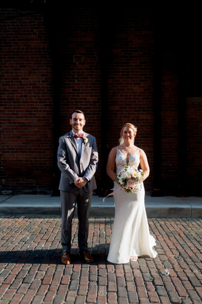 bride and groom in ally