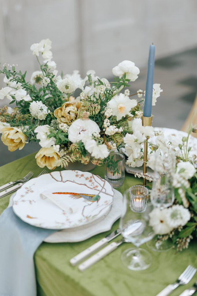 green themed styled wedding table with floral and china plates at the Columbus Museum of Art wedding venue