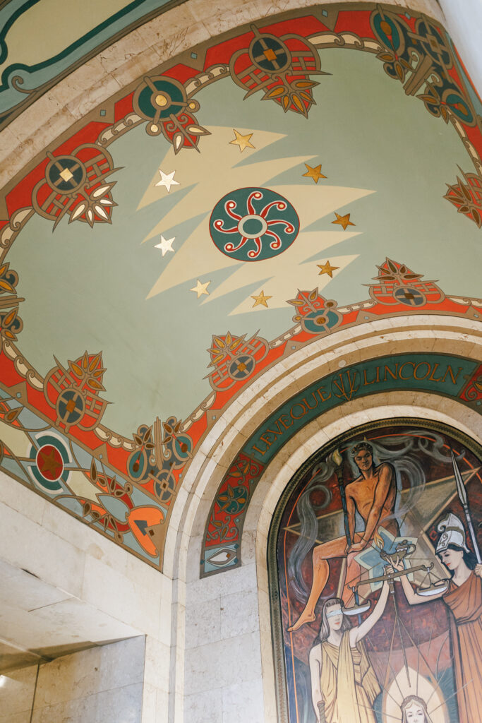 tiled ceiling frescos at the leveque hotel